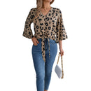 Women's business casual chiffon top with tie neck.