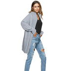 Front view of irregular knitted cardigan