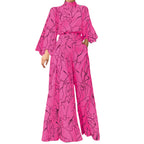 Women's White Print striped jumpsuit with long sleeves.