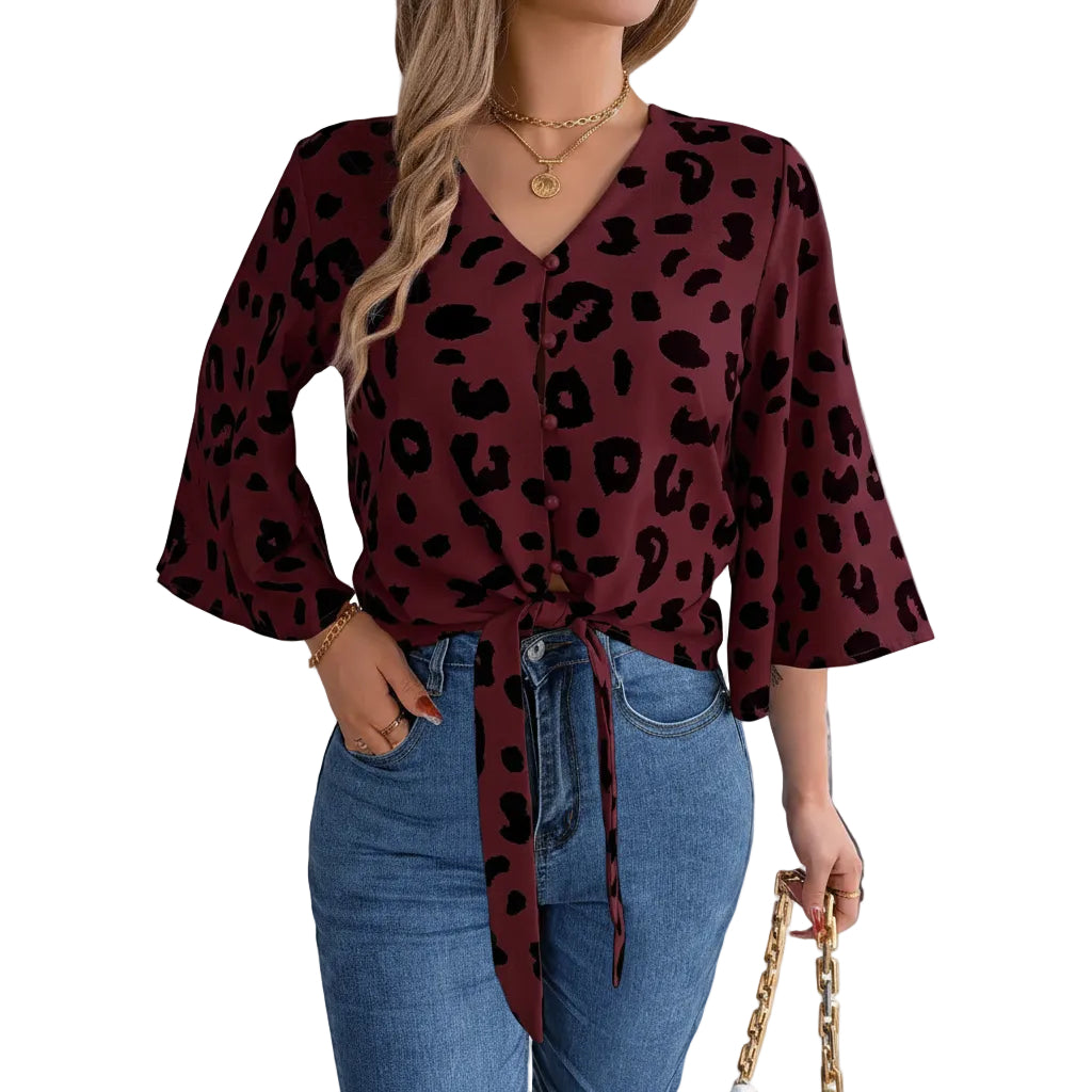 Women's chiffon leopard print blouse with elegant tie neck.
