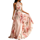 Women's floral sleeveless flared maxi dress front view.
