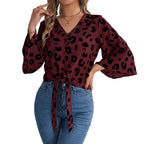 Women's casual leopard print tie neck chiffon blouse front view.