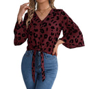 Women's casual leopard print tie neck chiffon blouse front view.