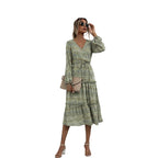 Women's long sleeve boho print dress with elegant style.