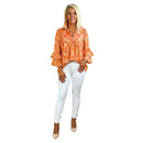 Women's loose fit floral print blouse with lightweight fabric.